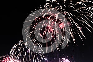 Explosion of multi-colored fireworks in Dubai against the night sky on a new year celebrations holidays