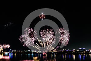 Explosion of multi-colored fireworks in Dubai against the night sky on a new year celebrations holidays