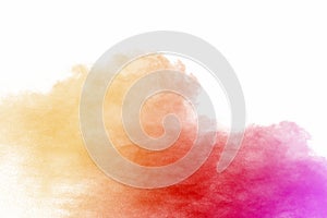Explosion of multicolored dust on white background