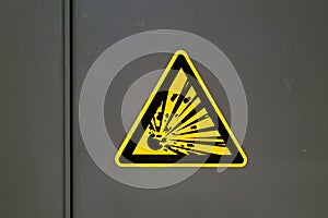 Explosive sign on a metal door