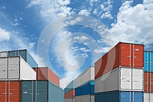 Export or import shipping cargo containers stacks under sky