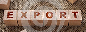 Export Word on Wood Cubes on a burlap. Trade reselling business concept