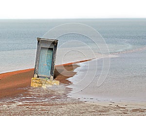 Exposed door at low tide abstract