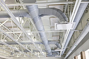 Exposed HVAC duct work in a modern elementary school.