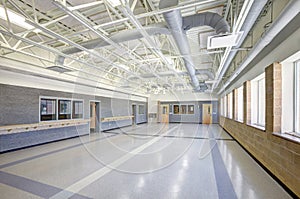 Exposed interior duct work in a school.