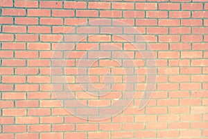 Exposed red brick wall texture as background and design element