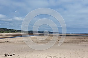 The exposed sandy beach at low tide at the mouth of the River North Esk on the northern point of Montrose Beach