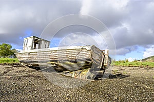 Exposed underside of abandoned boat