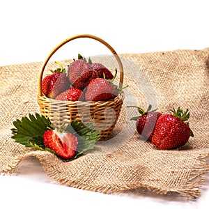 Exposition of fresh organic strawberry in the basket on white background, healthy food, perfect fruit for desert,