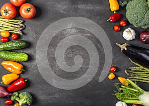 Exposition of fresh organic vegetables on wooden table. tomato, pepper, broccoli, onion, garlic, cucumber,  eggplant, black Eyed P