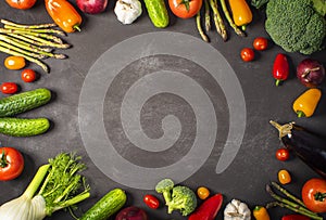 Exposition of fresh organic vegetables on wooden table. tomato, pepper, broccoli, onion, garlic, cucumber,  eggplant, black Eyed P