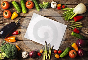 Exposition of fresh organic vegetables on wooden table. tomato, pepper, broccoli, onion, garlic, cucumber,  eggplant, black Eyed P