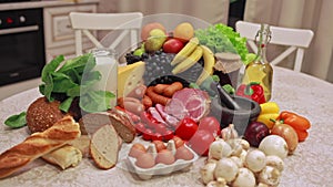 Exposition of fresh products. Vegetables, fruits, meat, mushrooms, bananas, butter, eggs, bread, herbs, milk, cheese