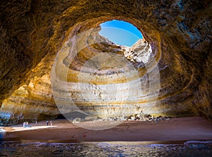 Famous sea cave at Benagil beach in Algarve, Portugal photo