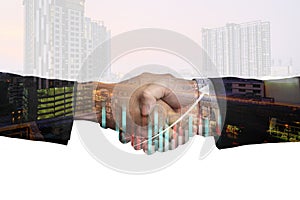 Exposure of two business handshakes for success of investment agreement and city night background, teamwork and partnership