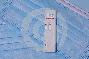 Express COVID-19 Omicron variant strain test Schnelltest on a medical masks.Diagnosis of coronavirus, Inhibition of disease