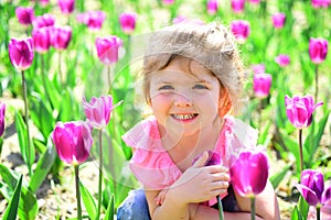 Express positivity. Small child. Natural beauty. Childrens day. Summer girl. Happy childhood. Springtime tulips. weather