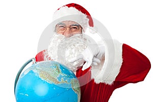 Expressionistic Santa pointing at north pole