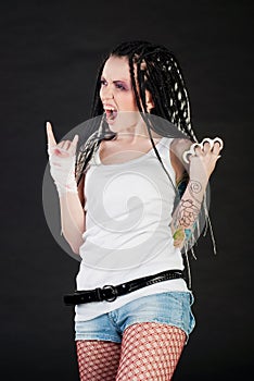 Expressive girl with knuckleduster photo