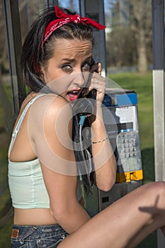 Expressive girl with phone