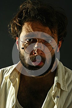 Expressive man on black background