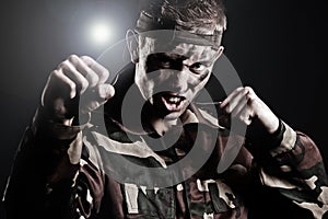 Expressive military man assaulting photo