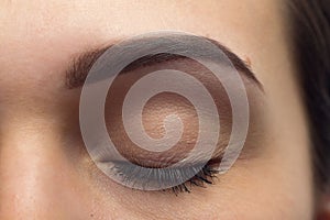 Expressive significant eye perfect shape of eyebrow photo