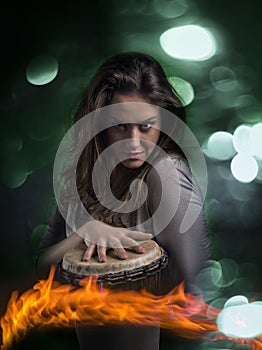 Expressive Wild Woman Playing Djembe Drum