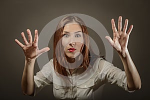 Expressive woman showing ten fingers