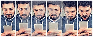 Expressive young man using a smartphone