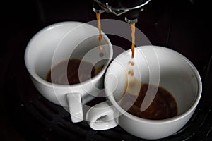 Expresso coffee machine with a coffee cups