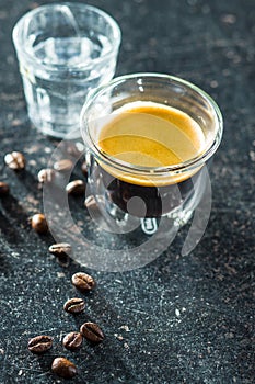 Expresso cup and coffee beans.