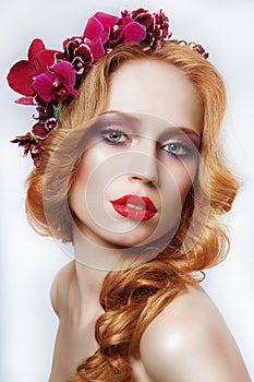 Exquisite Auburn Woman with Wreath of Flowers and Tress photo