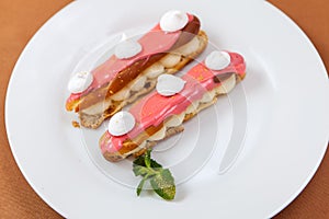 Exquisite cream dessert eclairs
