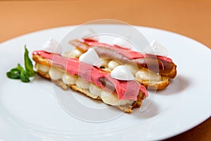 Exquisite cream dessert eclairs