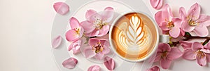 Exquisite flat white coffee flower latte art displayed on a spotless white tabletop photo