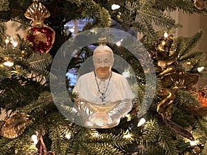 Exquisite Glass Christmas Ornament of Pope Francis on decorated Fraser Tree