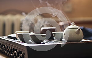 Exquisite Hot Tea in Teapot at Traditional Chinese Tea Ceremony. Set of Equipment