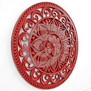 Exquisite red circular wall art isolated on white photo