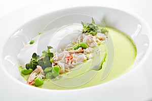 Green Pea Soup with Crab and Coconut Espuma photo