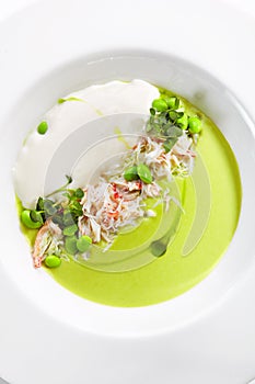 Green Pea Soup with Crab and Coconut Espuma photo