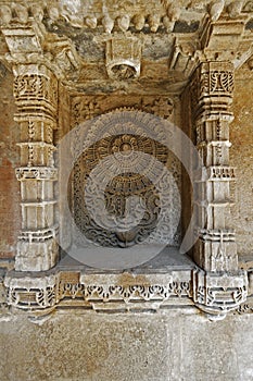 Exquisitely detailed motif in a niche on the side wall of Adalaj Ni Vav Stepwell or Rudabai Stepwell.  is intricately carved and
