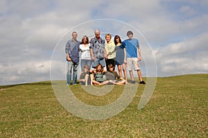 Extended family on hill photo