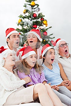 Extended family singing carols