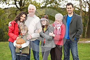 Extended Family On Walk Through Countryside photo