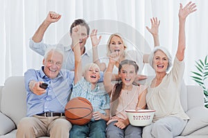 Extended family watching the tv