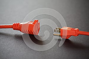 Extension Cord Being Plugged In photo