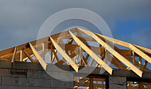 Extension of a family house, cubic shape modern with a flat roof and large windows and a terrace. wooden frame on which will be in