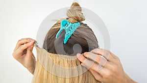 Extension of natural hair with hairpins clips