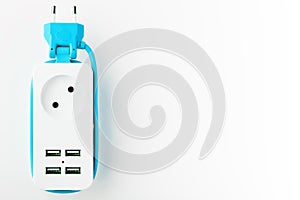 Extension Socket with USB Port on white background for charging phones and electronic devices, blue power cord